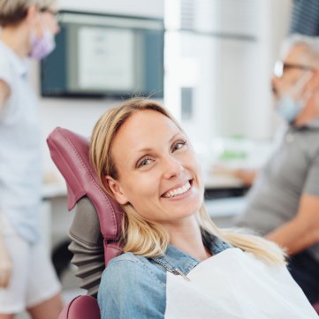 Woman smiling in the dental chair